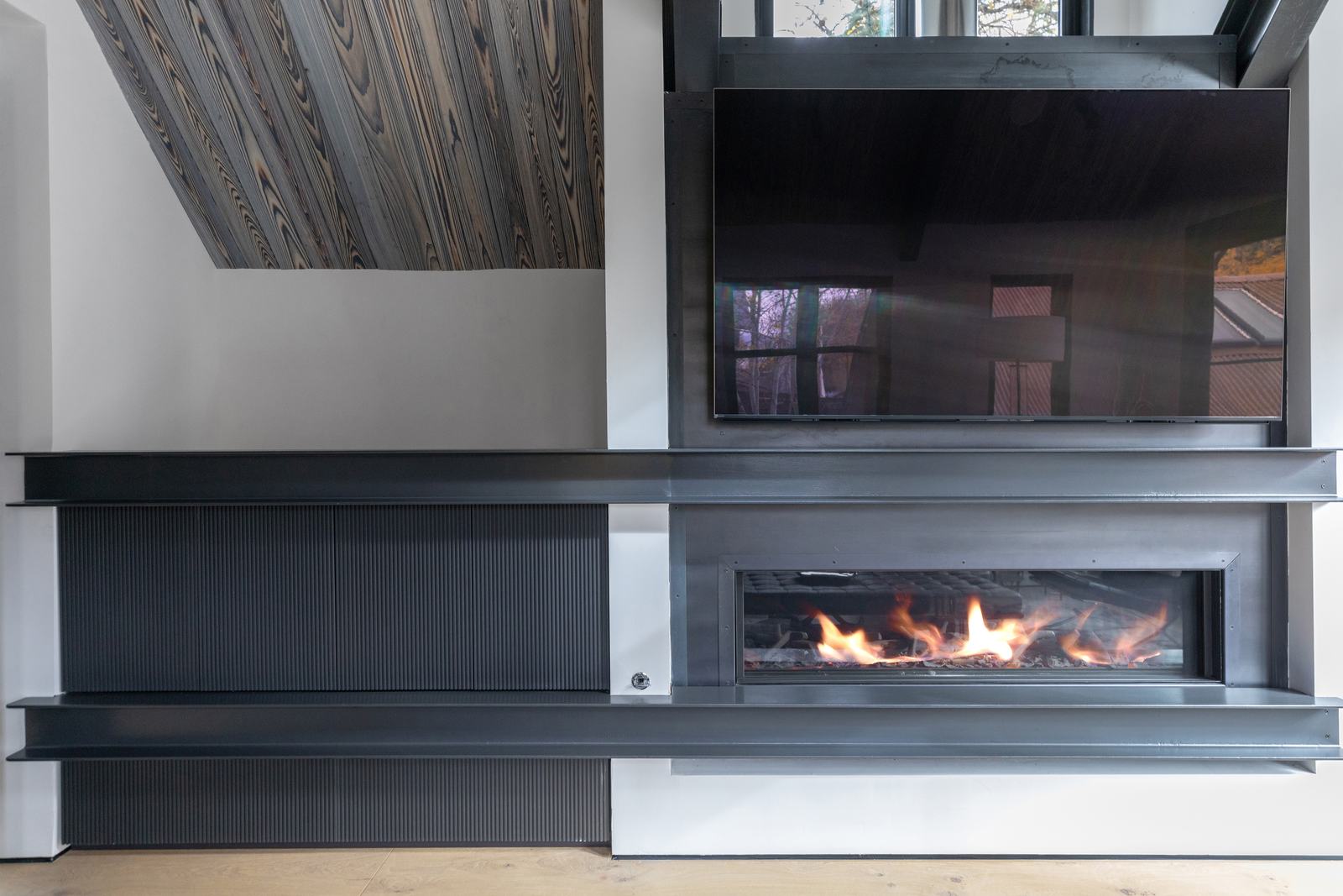 Great room fireplace at 524 East Columbia Avenue, built by UltraBuilders in Telluride, Colorado