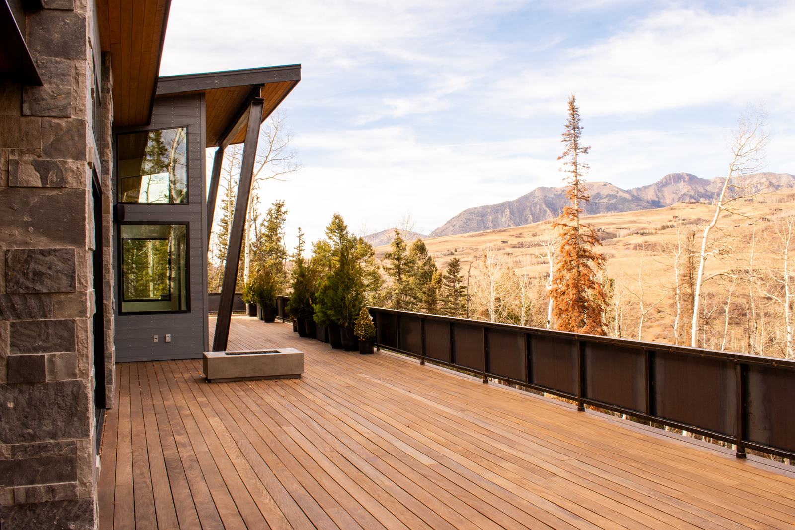 Deck and mountain views at 110 Lawson Overlook, built by UltraBuilders in Mountain Village, Colorado