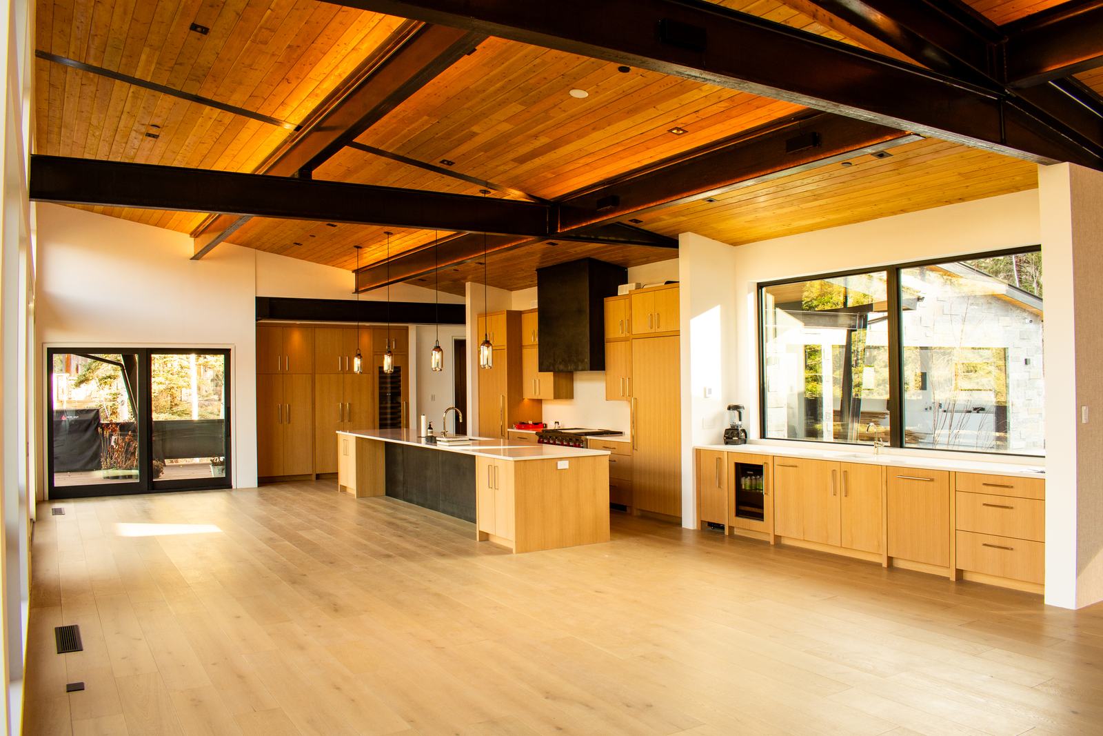 Great room and kitchen at 110 Lawson Overlook, built by UltraBuilders in Mountain Village, Colorado