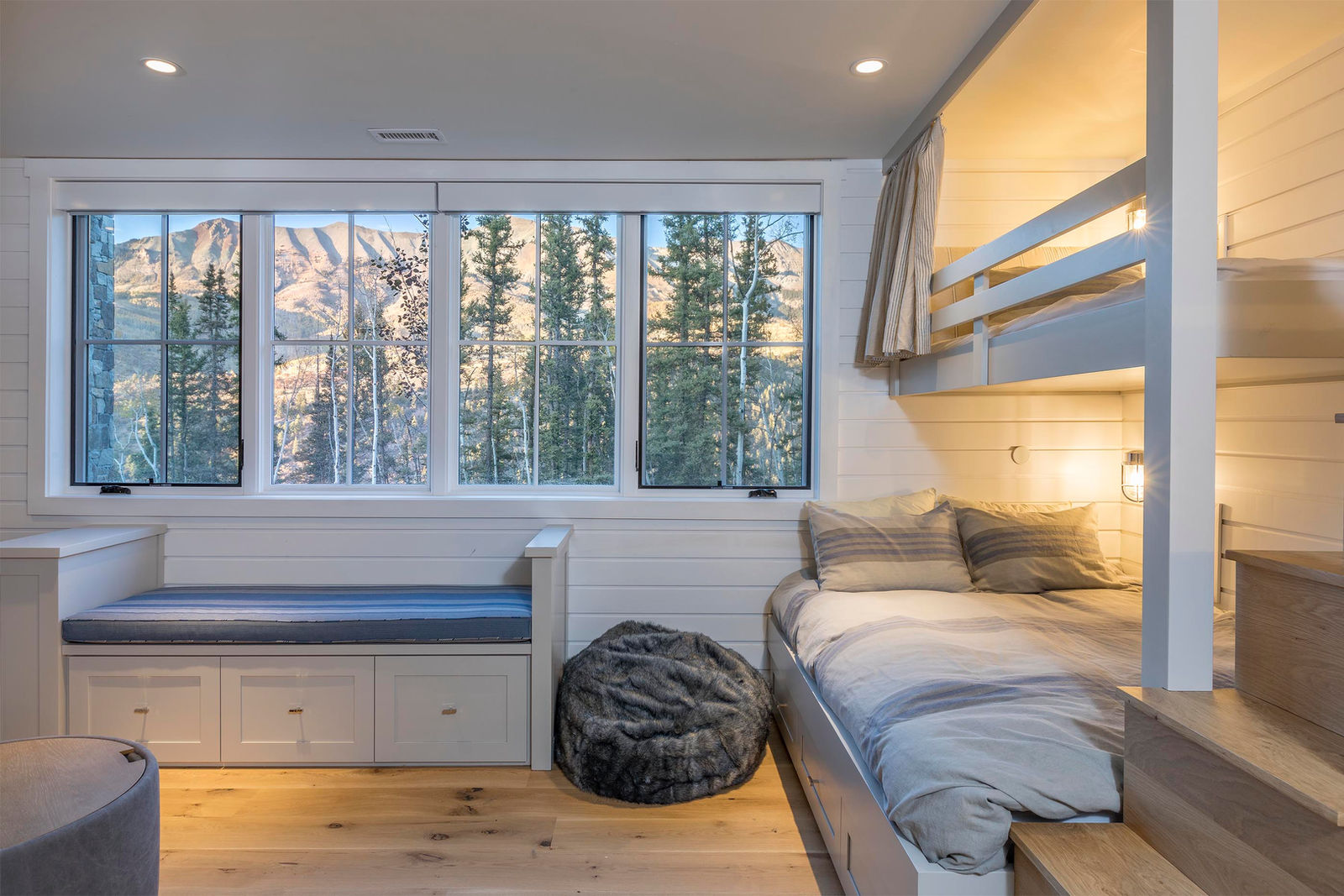 Bunk room window seat at 108 Lawson Overlook, built by UltraBuilders in Mountain Village, Colorado