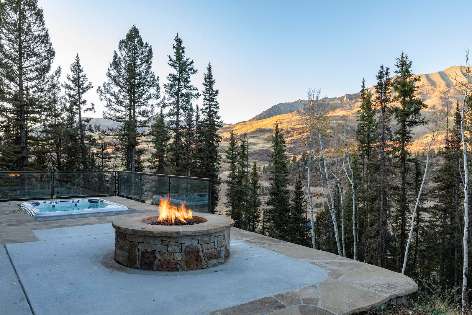 Hot tub and fire pit at 108 Lawson Overlook, built by UltraBuilders in Mountain Village, Colorado