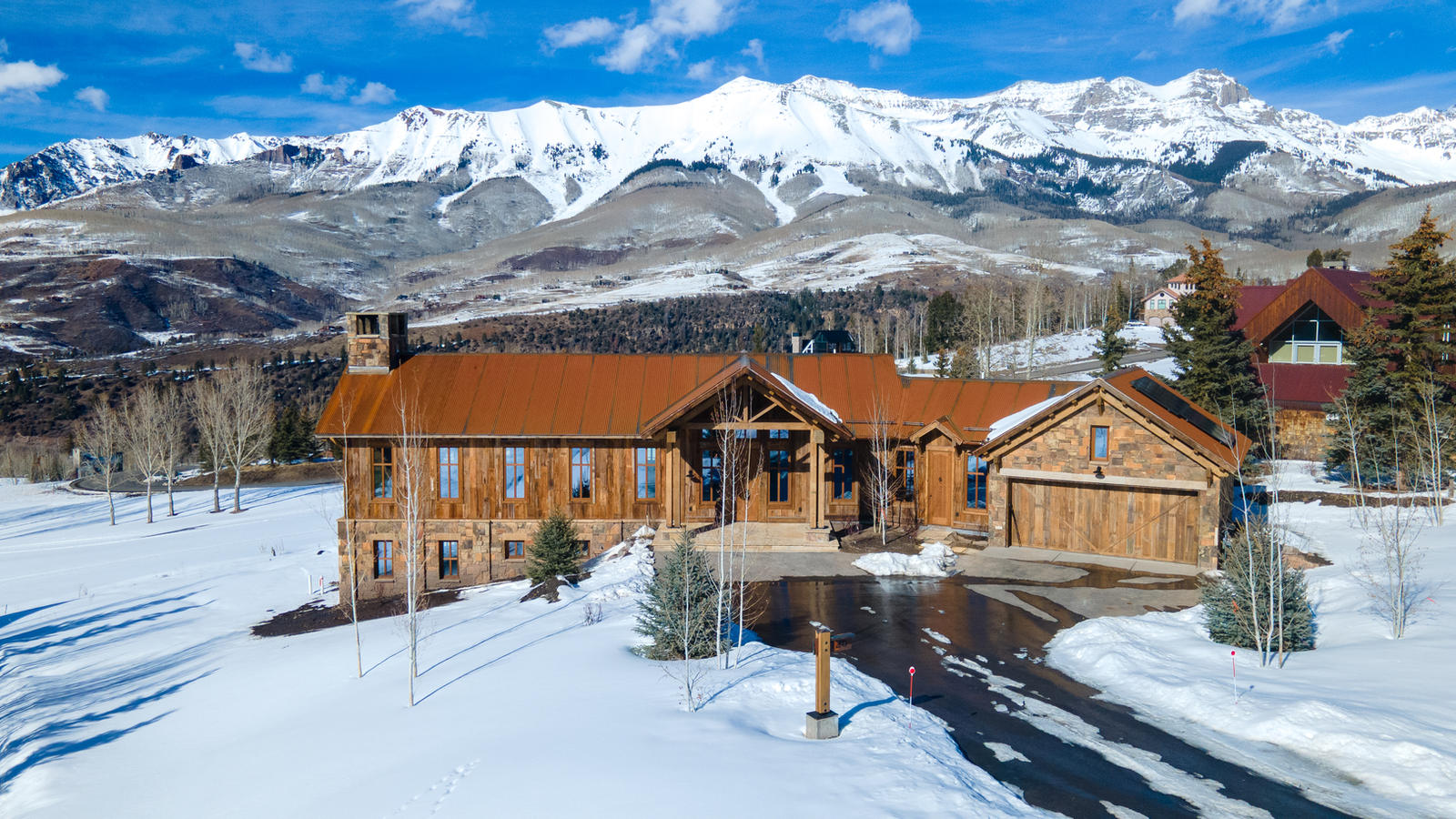 Aerial view to the range at 125 Russell Drive, built by UltraBuilders in Mountain Village, Colorado