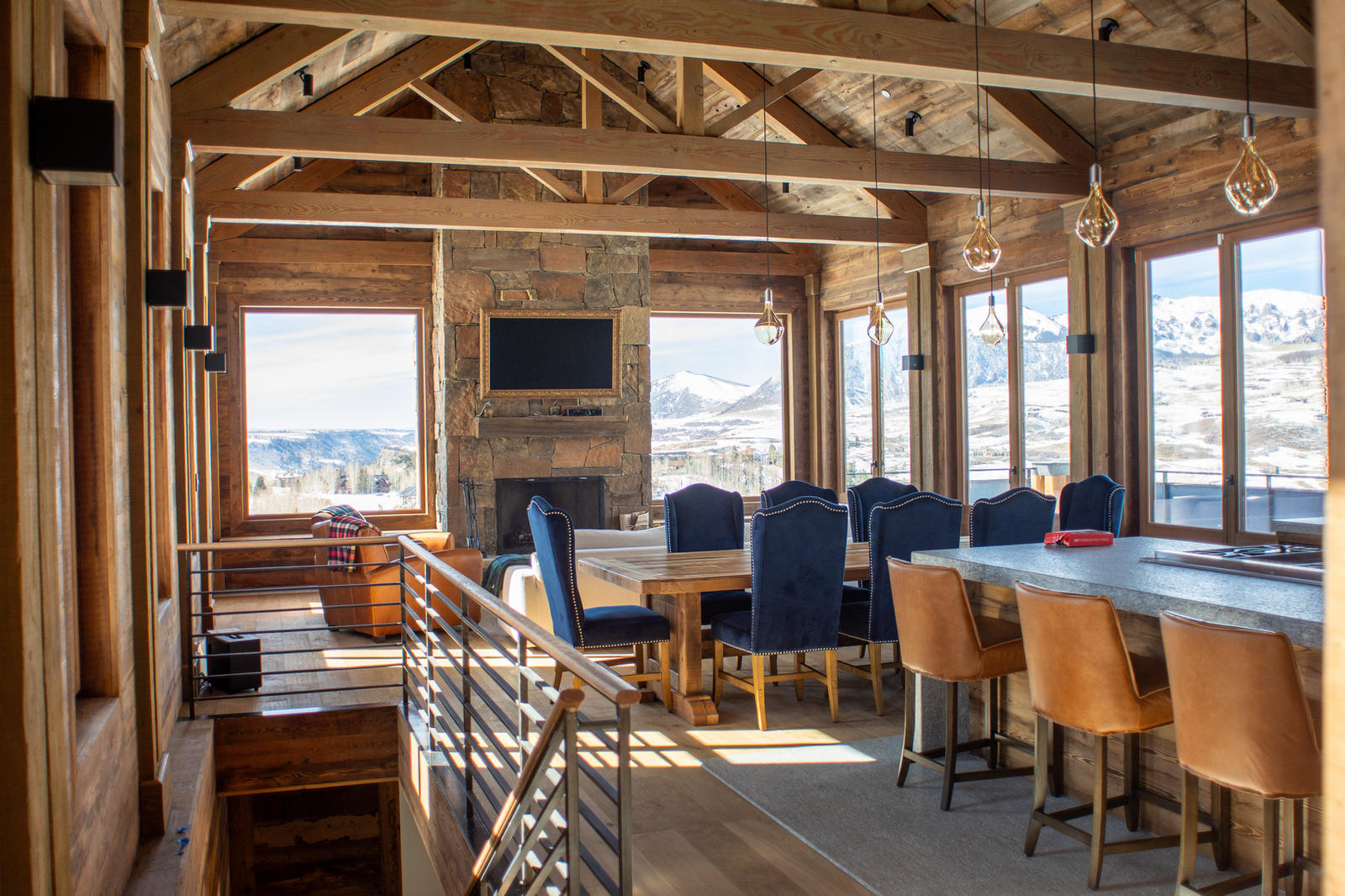 Great room and dining at 125 Russell Drive, built by UltraBuilders in Mountain Village, Colorado