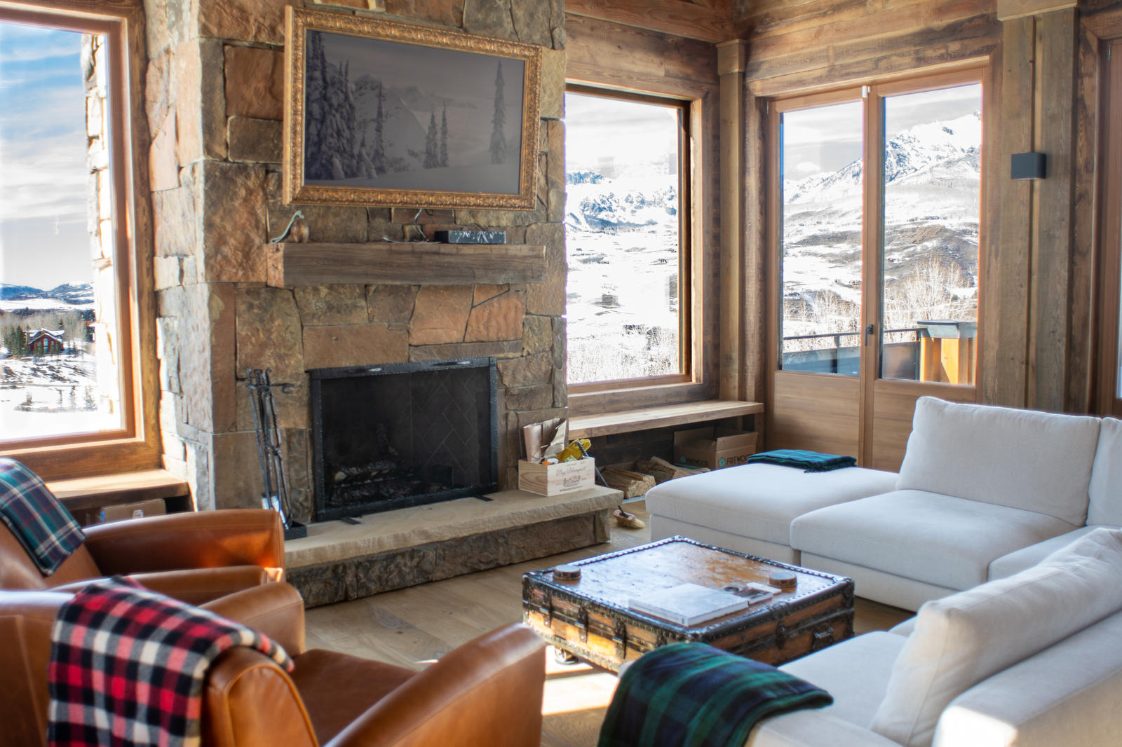 Living room and fireplace at 125 Russell Drive, built by UltraBuilders in Mountain Village, Colorado