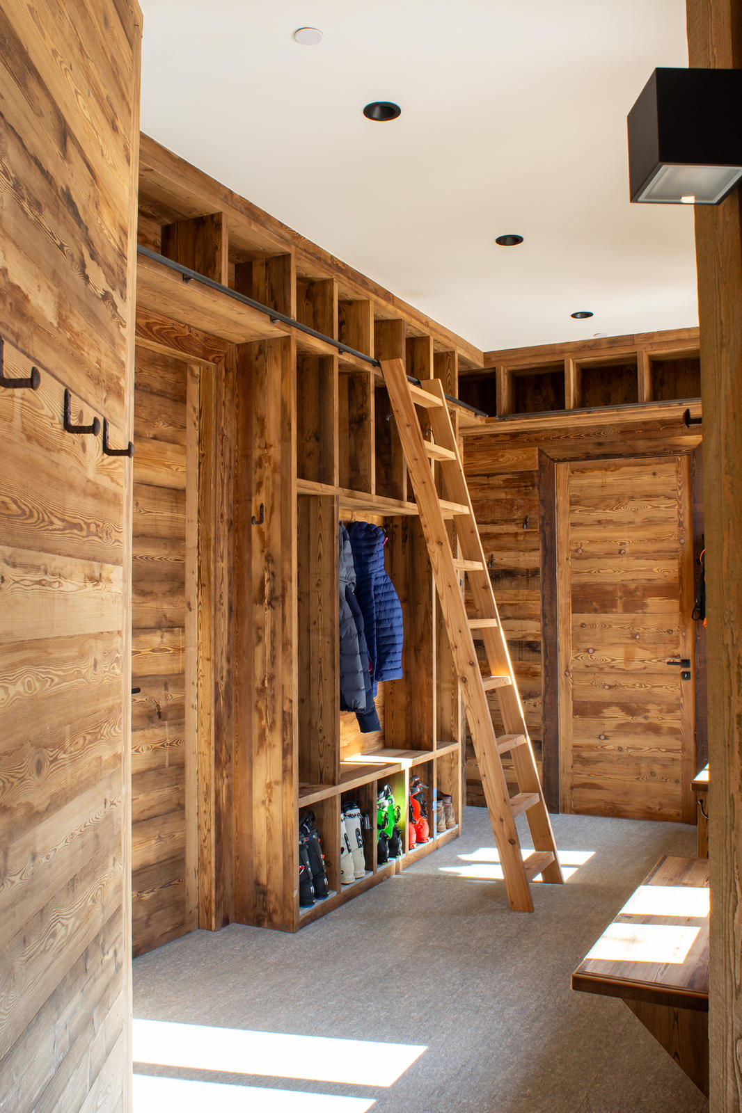 Loft ladder at 125 Russell Drive, built by UltraBuilders in Mountain Village, Colorado